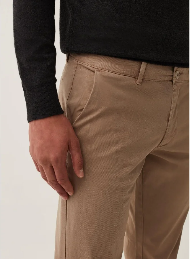 او في اس Solid colour stretch chino trousers