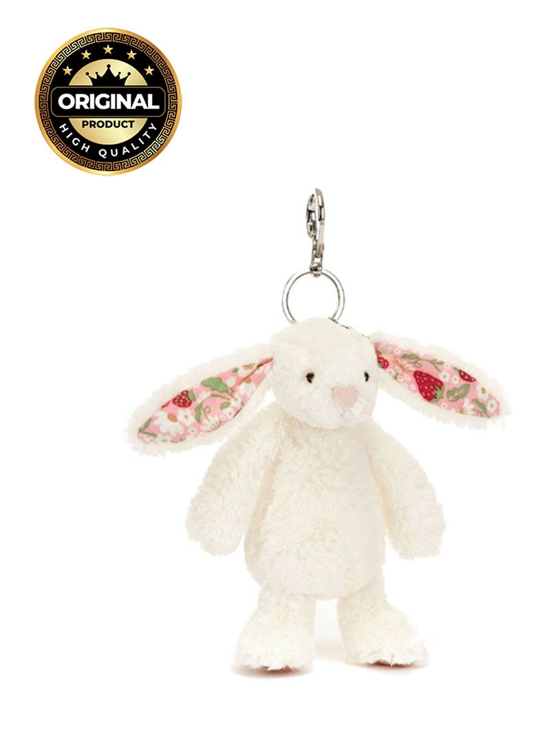 Jellycat Blossom Cream Bunny Berry Bag Charm 13cm, Soft Plush Bunny Keyring with Strawberry Floral Ears - Image 1