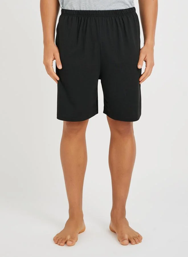 Styli Styli Textured Pleated Tapered Fit Trousers