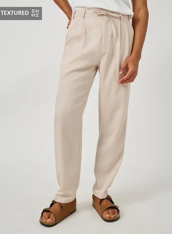 Styli Styli Textured Pleated Tapered Fit Trousers