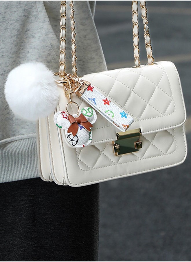 Elegant metal and plaid leather keychain set with a fluffy faux fur pom-pom and Mickey charm. Stylish keychain for women, featuring golden accents and multiple key rings for functionality. Includes a plaid leather strap and matching accessories, making it a perfect gift choice. - pzsku/ZC623DD23A4B8BA8AEB6DZ/45/_/1735328669/a0e7bd97-83d7-4956-98cf-108a6c1a8c4c