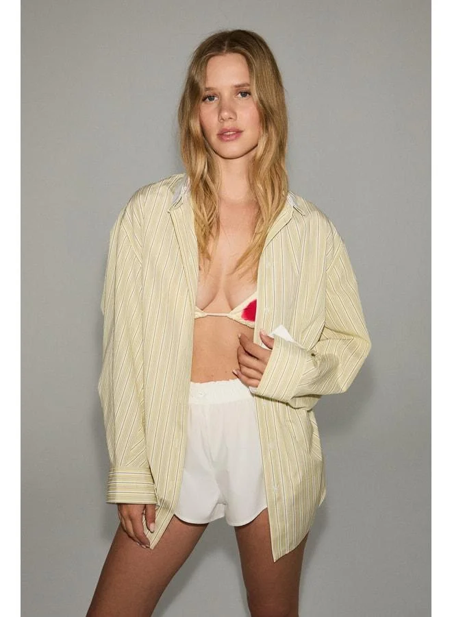 جريميلانج قميص LUMORE للنساء بتقنية Oversize Fit من القطن العضوي 100% أصفر مخطط.
