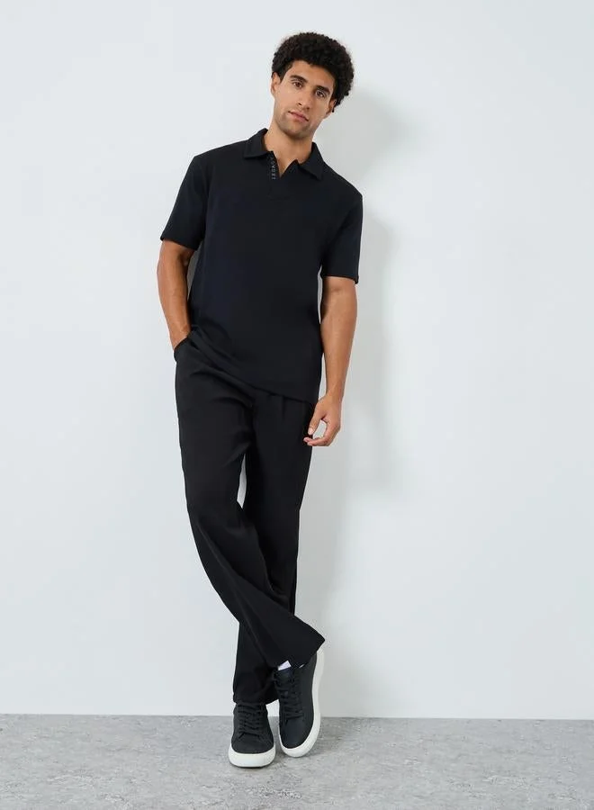Styli Men Black Solid Relaxed Fit Polo