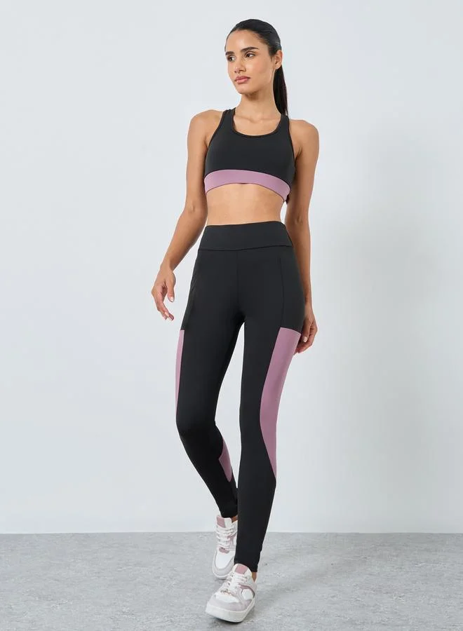 Styli Active  Pack of 3 - Color Block Detail Sports Bra, Mesh Insert Racer Back Tank and Leggings for Women | Best Price UAE