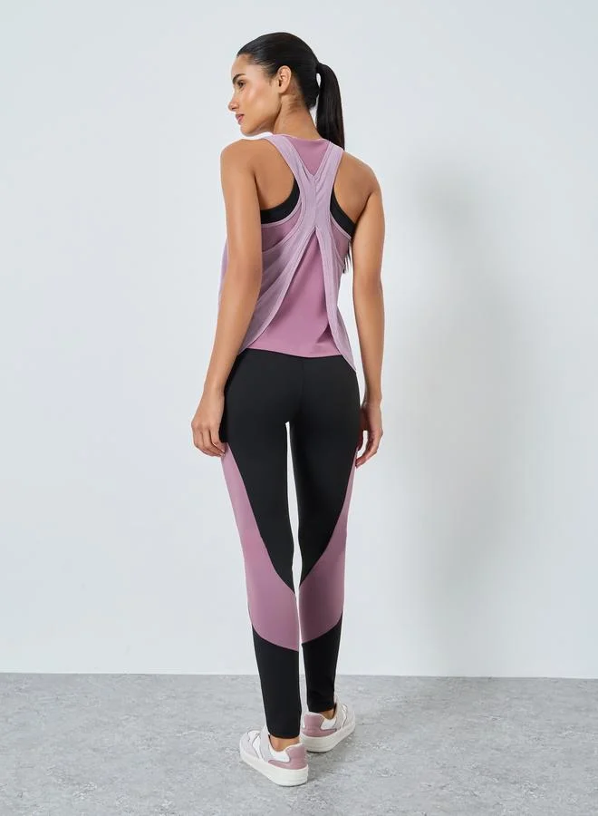 Styli Active  Pack of 3 - Color Block Detail Sports Bra, Mesh Insert Racer Back Tank and Leggings for Women | Best Price UAE