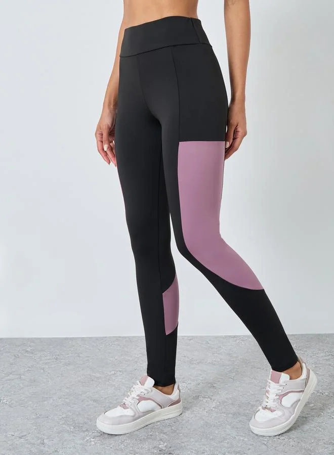 Styli Active  Pack of 3 - Color Block Detail Sports Bra, Mesh Insert Racer Back Tank and Leggings for Women | Best Price UAE
