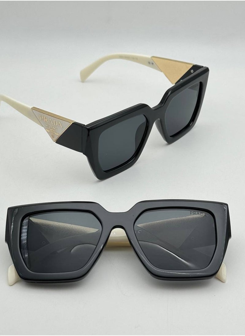 PRADA - Women's sunglasses for protection from the sun's rays, black and gold - Image 1