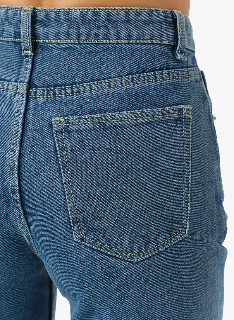 Ginger Ripped High Rise Wide Leg Jeans