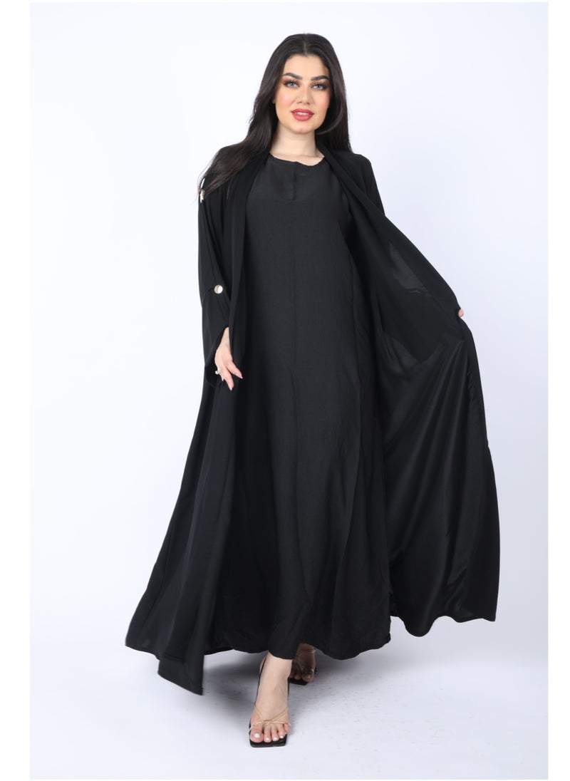 FULL JOY - Maxi, flared Abaya with a pleat at the back and golden buttons, Black - Image 1