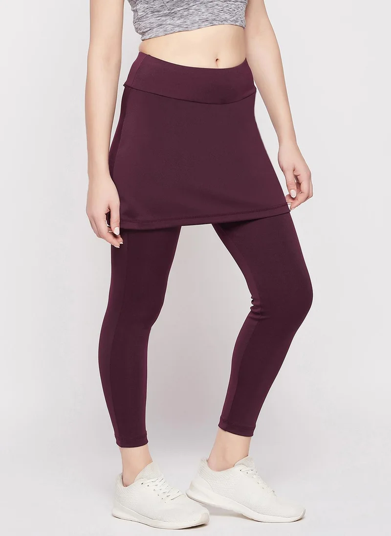 Clovia burgundy Clovia Snug-Fit High Rise Active Skirt with Attached Tights in Plum Colour for Women | Best Price UAE
