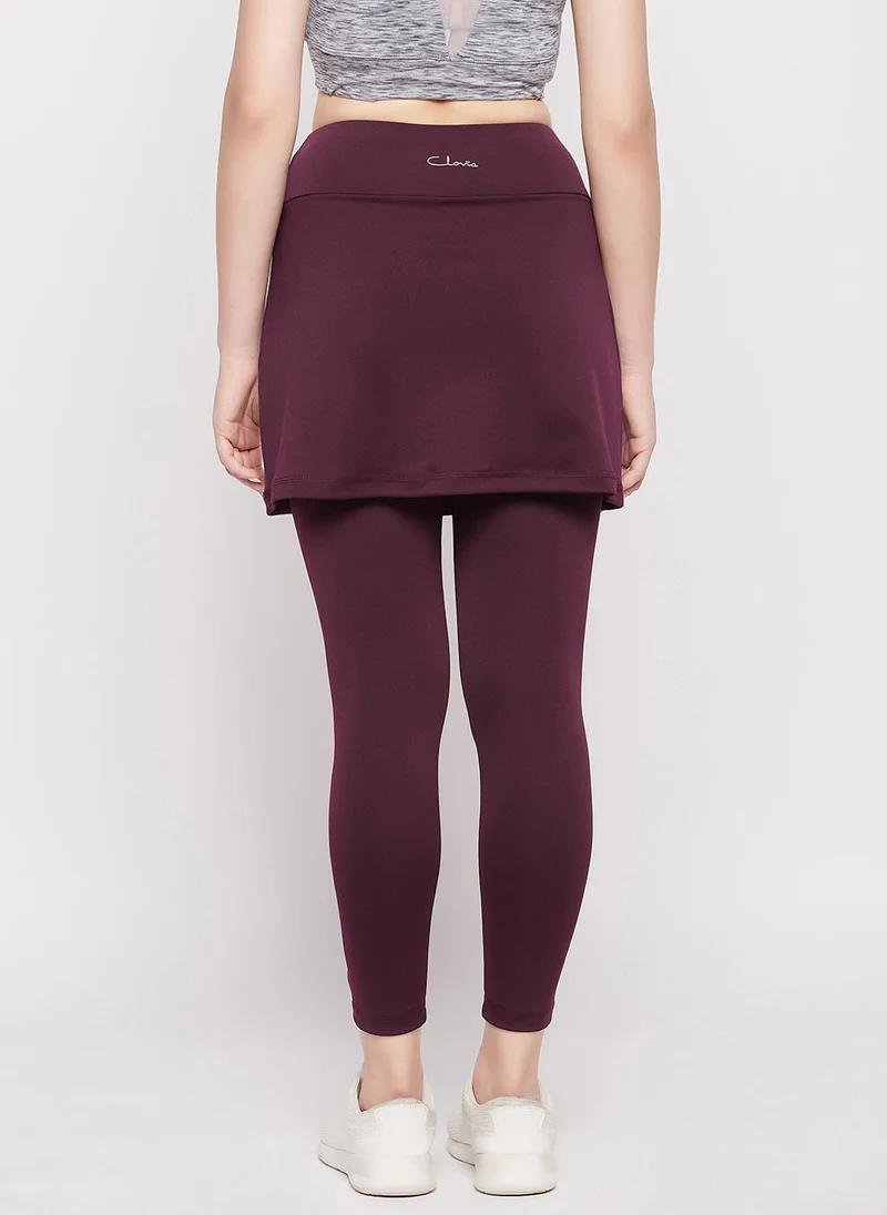 Clovia burgundy Clovia Snug-Fit High Rise Active Skirt with Attached Tights in Plum Colour for Women | Best Price UAE