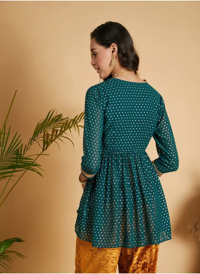 SASSAFRAS Embroidered Trim Foil Print Wrap Peplum Top by Styli