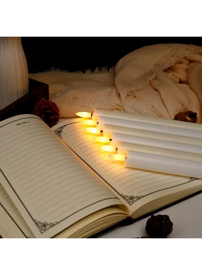 12 قطعة من الشموع البيضاء الخالية من اللهب بتقنية LED، تعمل بالبطارية، مع وميض واقعي لتزيين العطلات. - Image 1
