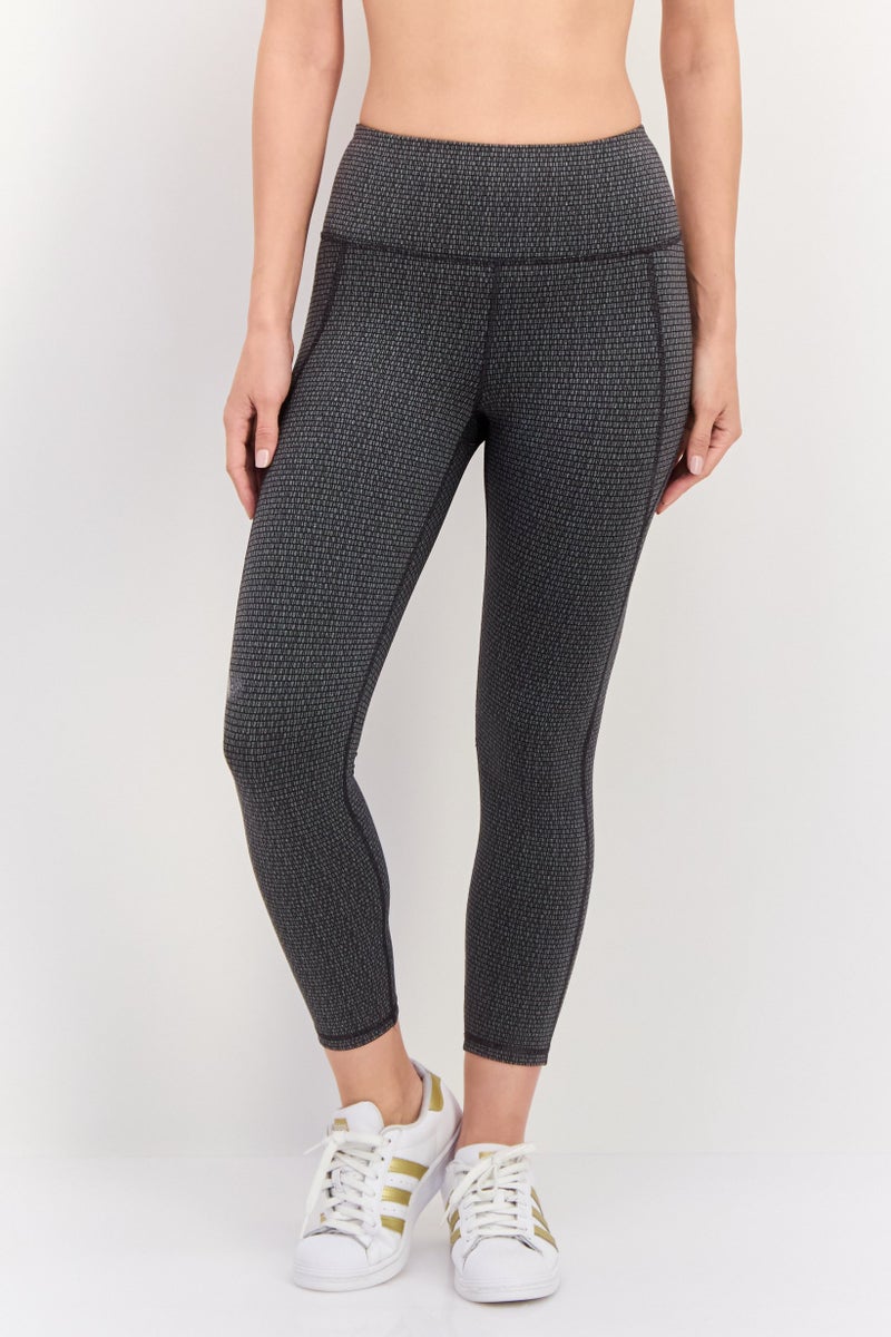 UNDER ARMOUR  leggings تدريبية ضيقة منسوجة للنساء، رمادي غامق - Image 1
