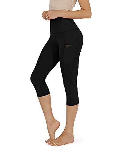 ODODOS Women's High Waisted Yoga Capris with Pockets,Tummy Control Non See Through Workout Sports Running Capri Leggings, Black,Large - Image 1
