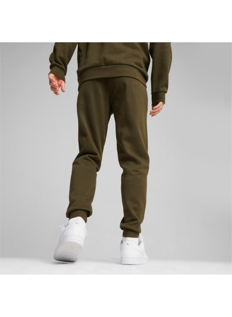 PUMA Ess Logo Pants Fl Cl (S) Dark Olive  - Image 2