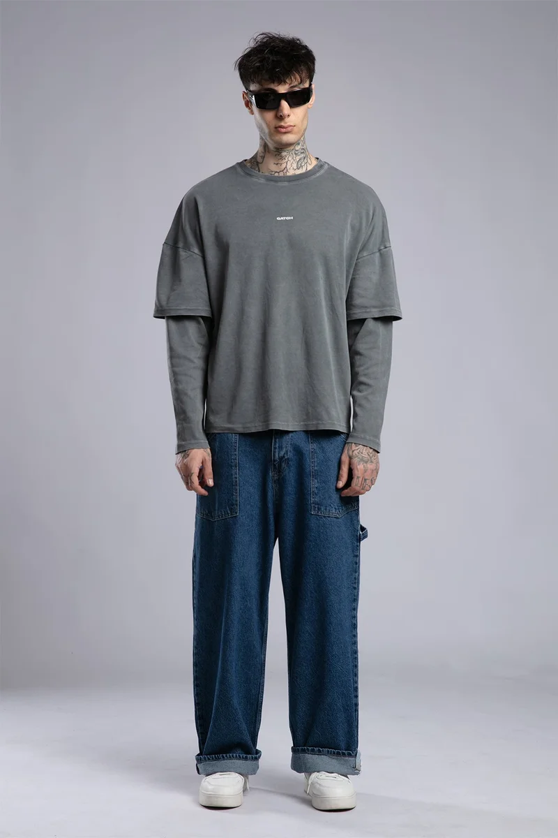 كاتش تفاصيل عملية بنطلون جينز واسع