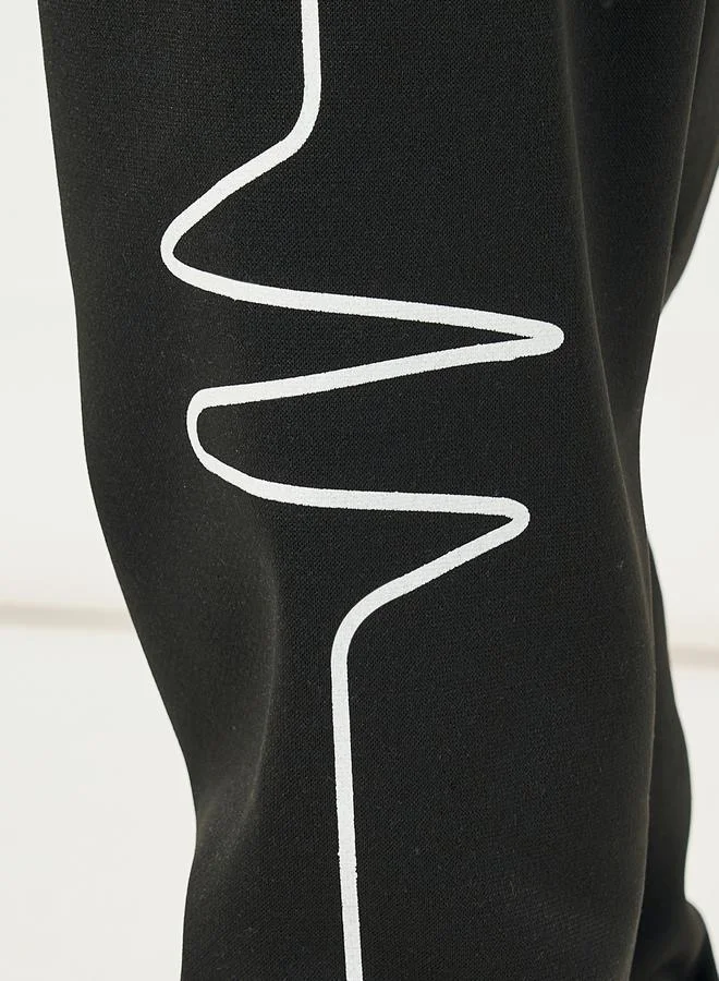 Styli Curved Lined Print Cuffed Joggers