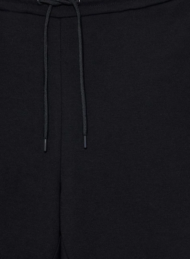ماكسيم Men Relaxed Fit Cut and Sew Joggers with Drawstring Closure