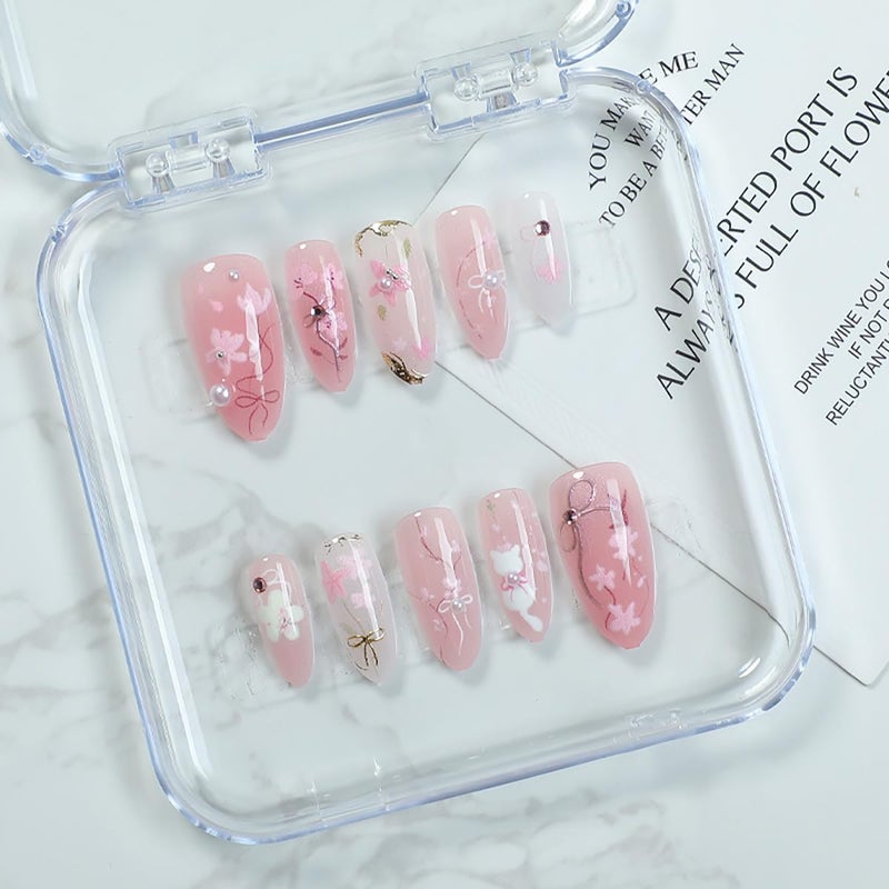 KRTBKR 30Pcs Pink Flower Press on Nails Medium Almond Fake Nails Peach Blossom with 3D Rhinestones Pearl Gold Glitter Design Artificial Cute Cat Nails Stick on Nails Spring False Nails for Women Acrylic Nail - Image 4