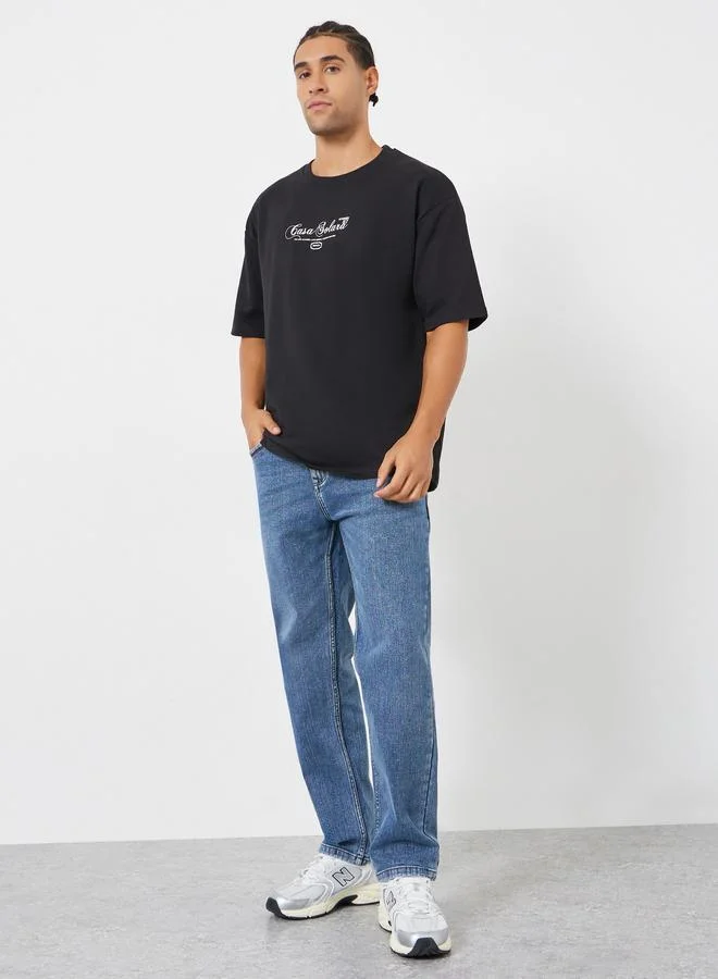 Styli Men Black Graphic Print Oversized T-Shirt
