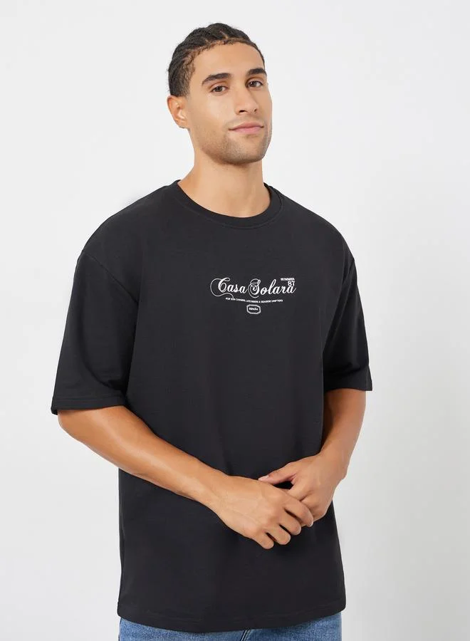 Styli Men Black Graphic Print Oversized T-Shirt