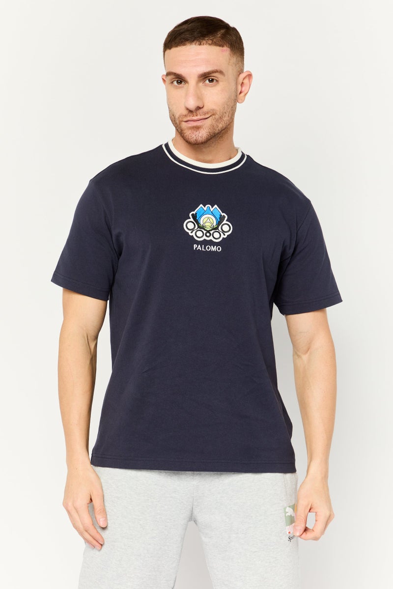 Puma x Palomo Men Sportswear Fit Short Sleeve Outdoor T-Shirt, Navy - Image 1