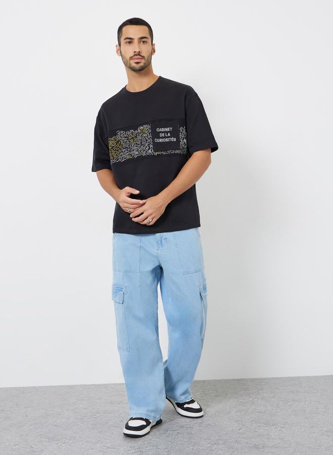 Styli Men Black Graphic Print Oversized T-Shirt - Image 2