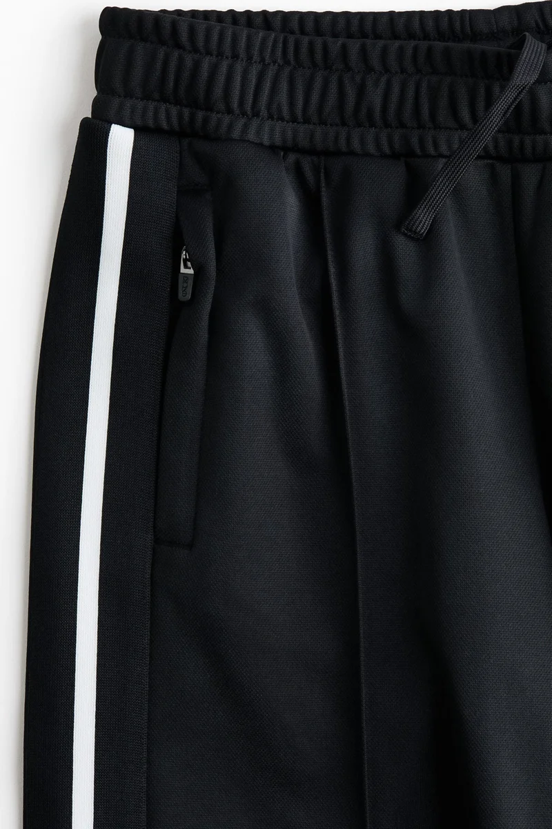 اتش اند ام بنطلون رياضي بقصّة مريحة من نسيج دراي موف