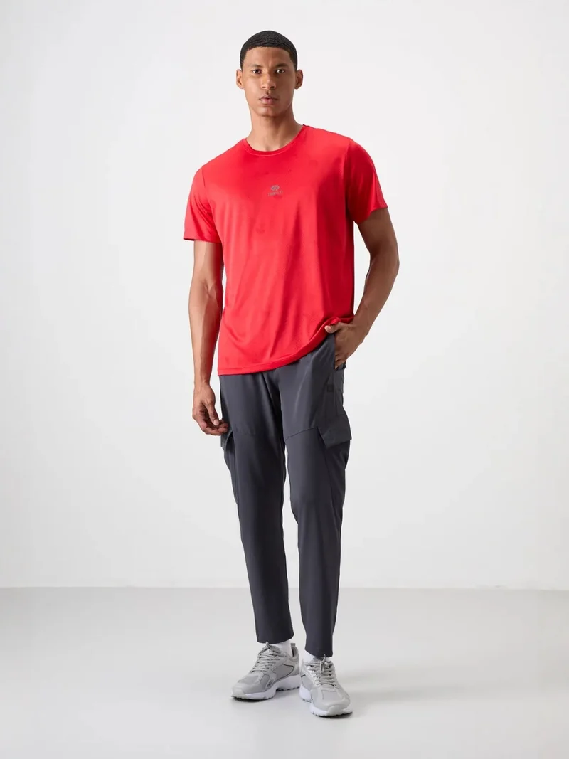 تومي لايف TOMMY Men's Solid Bird's Eye Crew Neck T-Shirt