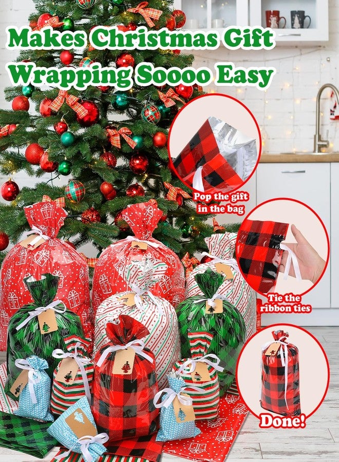 أكياس هدايا عيد الميلاد بأحجام متنوعة، 34 كيسًا لهدايا عيد الميلاد، أكياس هدايا صغيرة/متوسطة/كبيرة/كبيرة جدًا مع أربطة شريطية، أكياس تغليف هدايا بلاستيكية قابلة لإعادة الاستخدام على شكل بابا نويل، متوفرة بكميات كبيرة - Image 3