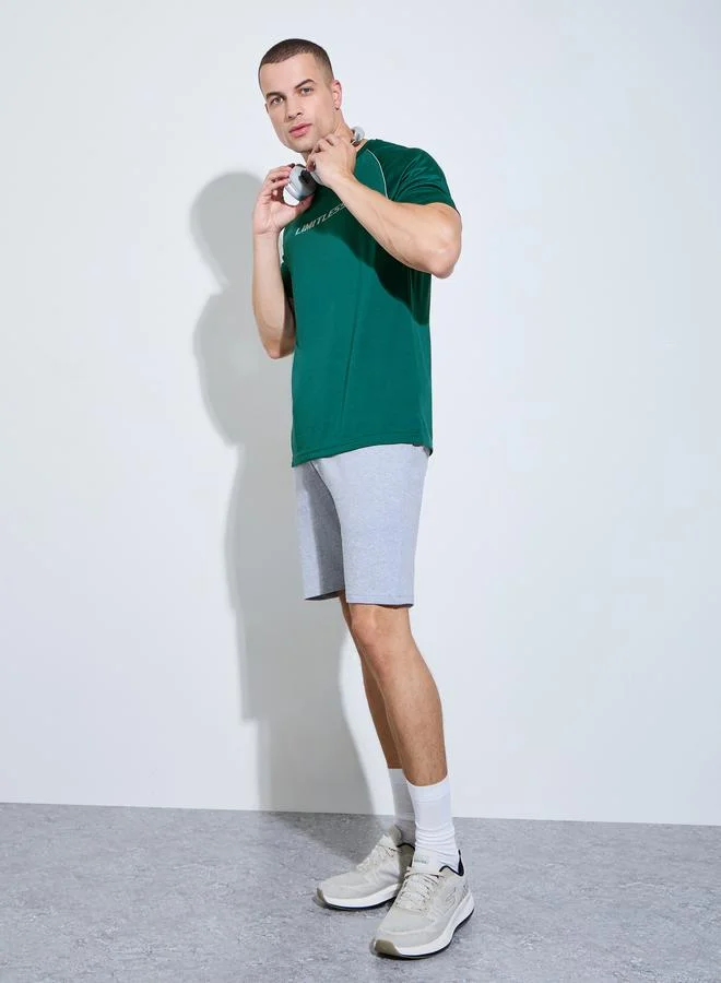 Styli Men Teal Graphic Print Raglan Sleeves Regular Fit T-Shirt