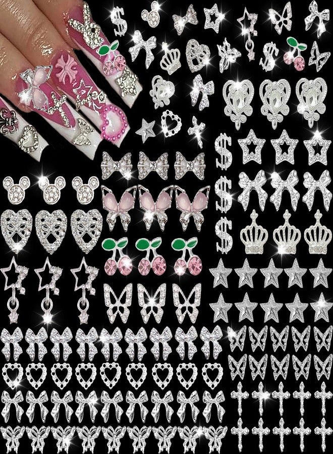 KACHIMOO 106 Pcs Nail Charms and Gems Silver Nail Charms Nail Rhinestones for Nails Design 3D Butterfly, Bow, Star,Cherry,Cross,Dollar,Heart Shapes for Acrylic Nails (19 Styles) - Image 1