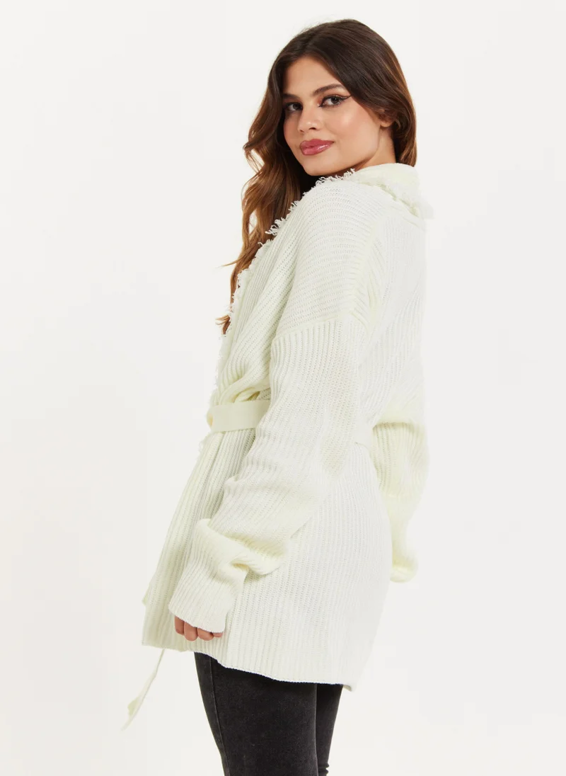 Liquorish كارديجان مفتوح من الأمام بلون كريمي وتفاصيل شراشيب