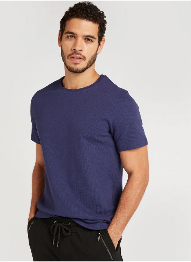 ايكونيك Iconic Textured Slim Fit T-shirt with Crew Neck and Short Sleeves