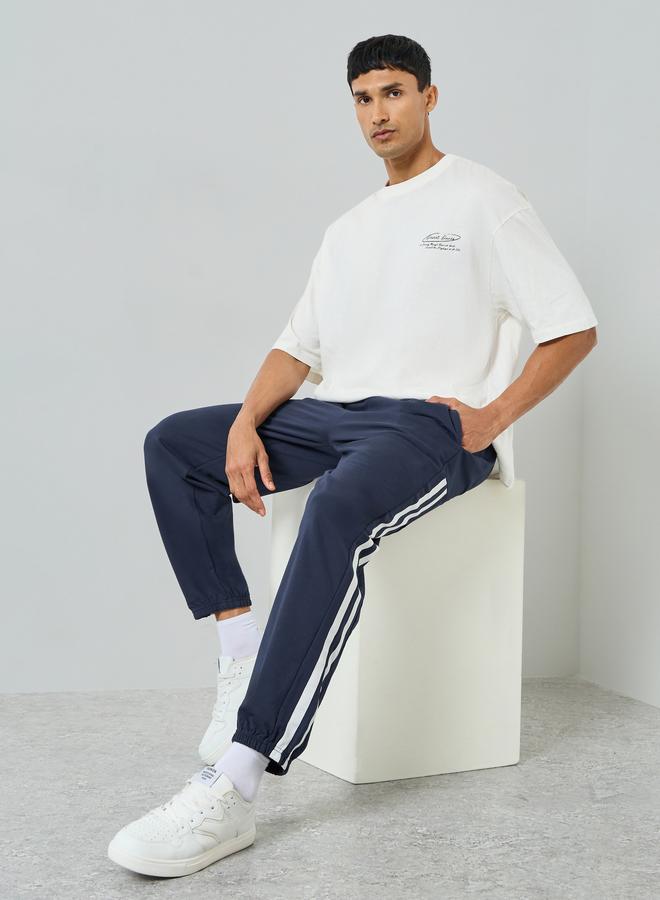 Styli Men Navy Blue Side Striped Panel Relaxed Fit Terry Joggers - Image 2
