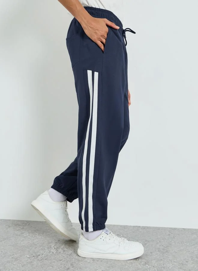Men Navy Blue Side Striped Panel Relaxed Fit Terry Joggers