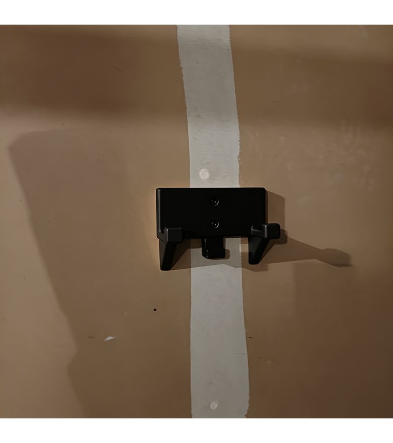 A Black 3D Printed Wall Mounted Bracket For Lawn Mowers And Hedge Trimmers Featuring A Sturdy Design And Durable ABS Material Suitable For Workshops Garages And DIY Enthusiasts - Image 5