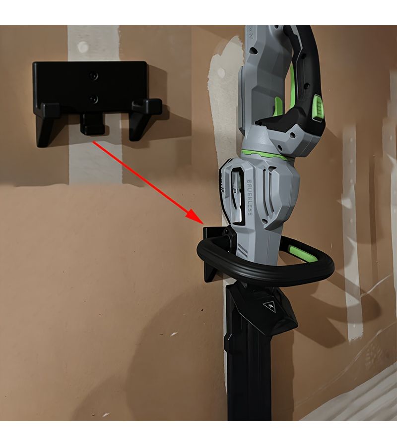 A Black 3D Printed Wall Mounted Bracket For Lawn Mowers And Hedge Trimmers Featuring A Sturdy Design And Durable ABS Material Suitable For Workshops Garages And DIY Enthusiasts - Image 1