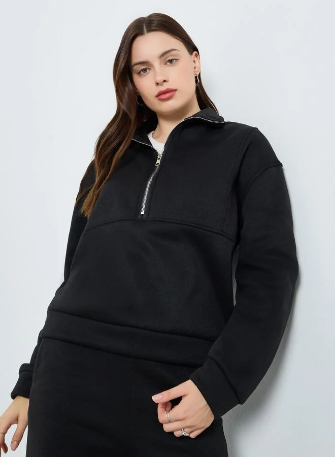 ستايلي طقم بلوزة بسحاب وبنطلون رياضي مضلع