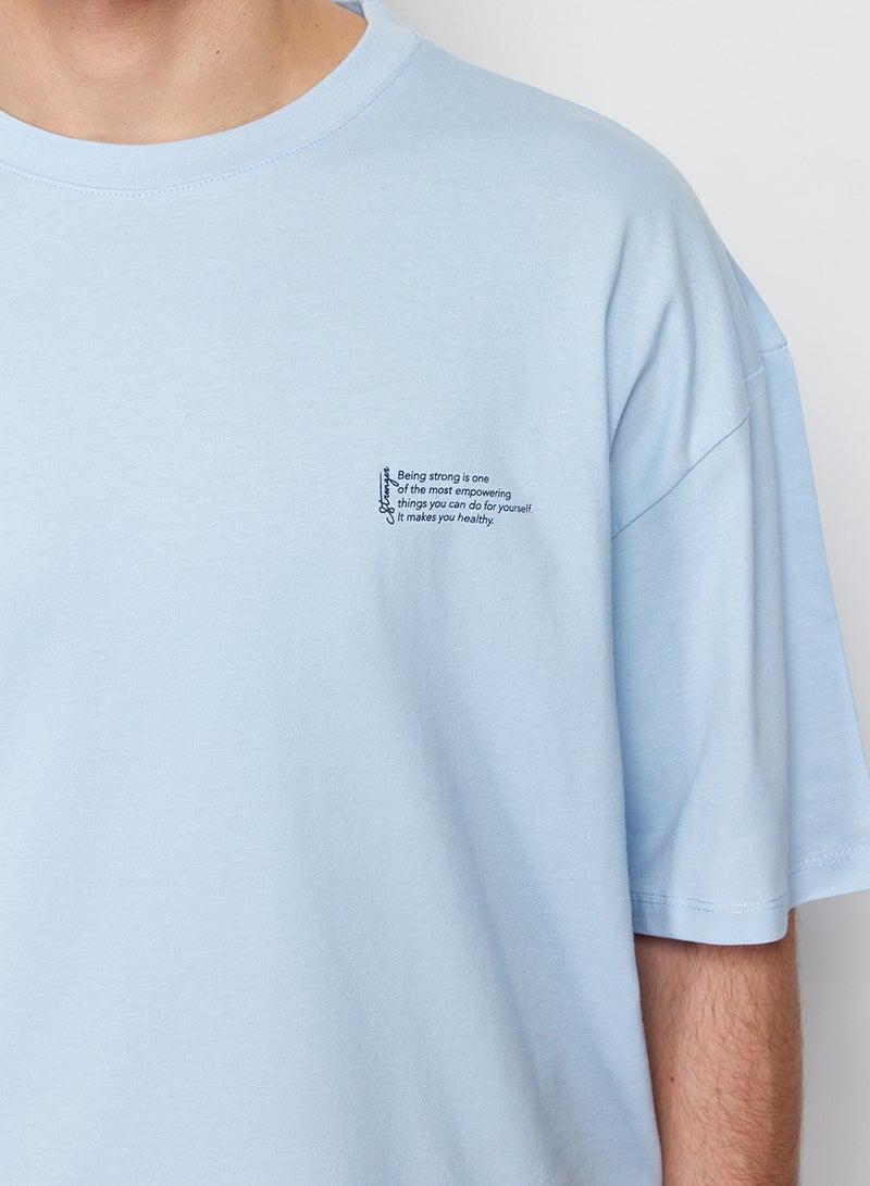 trendyol Light Blue Oversize Cotton Crew Neck T-Shirt with Minimal Print TMNSS23TS00084 - Image 5