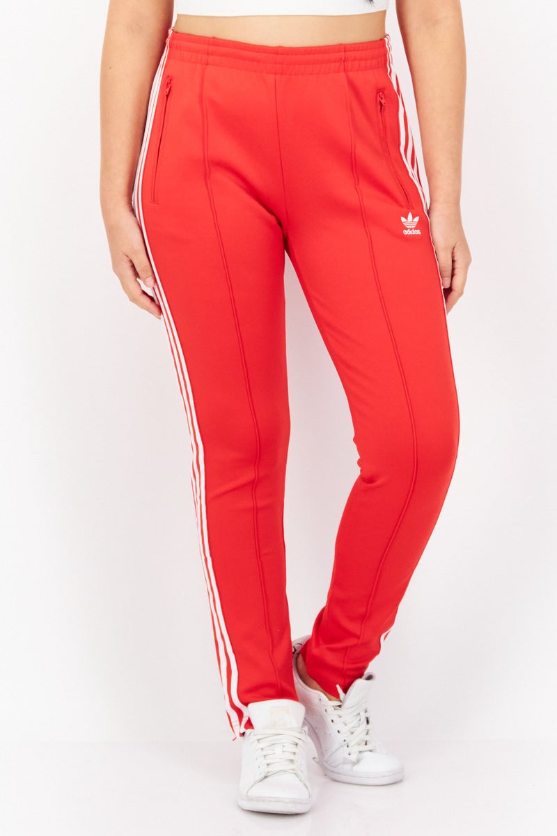adidas Originals Women Sportswear Fit Training Sweatpants, Red - Image 1