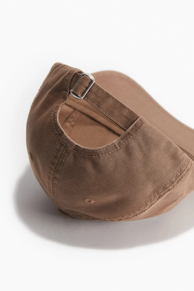 اتش اند ام قبعة من قطن التويل