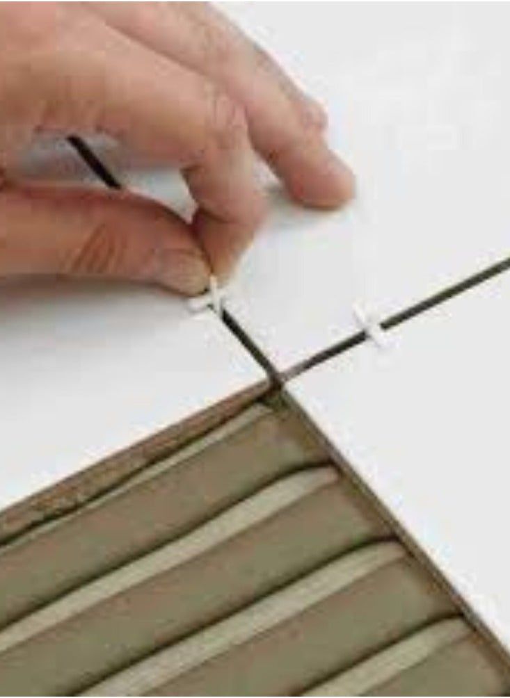 KNP - KNP 100PCS Tile Spacers in 4mm are essential tools for achieving precise and uniform spacing between tiles during installation. - Image 1