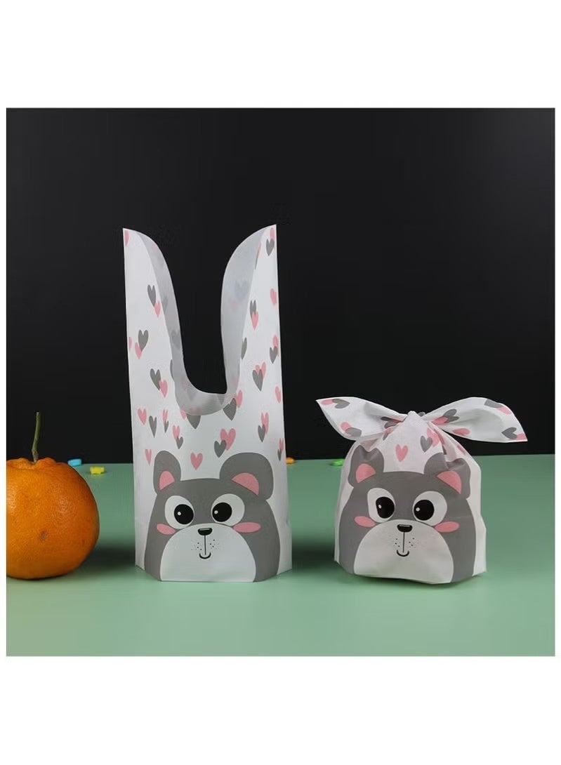 عبوة من 50 كيس حلوى وأكياس هدايا للأطفال، وأكياس هدايا للأطفال، وأكياس حلوى مطبوعة على شكل دب لطيف للأولاد والبنات، وأكياس تخزين الطعام وتغليف الهدايا لحفلات استقبال المولود وحفلات الزفاف وحفلات أعياد الميلاد - Image 2