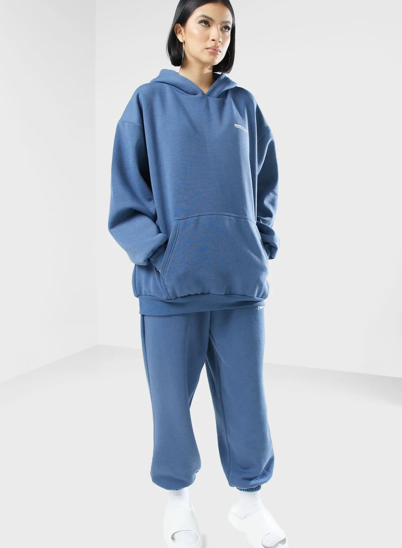 The Giving Movement  Oversized Logo Hoodie  | Best Price UAE