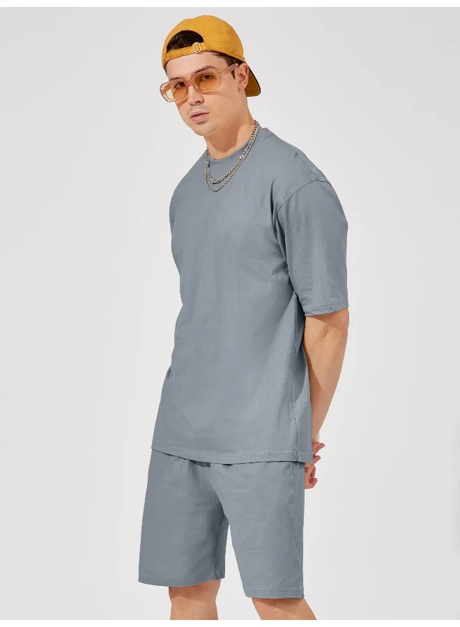 مانياك طقم رجالي قطن رمادي فاتح بأكمام ثلاثة أرباع وقصة واسعة