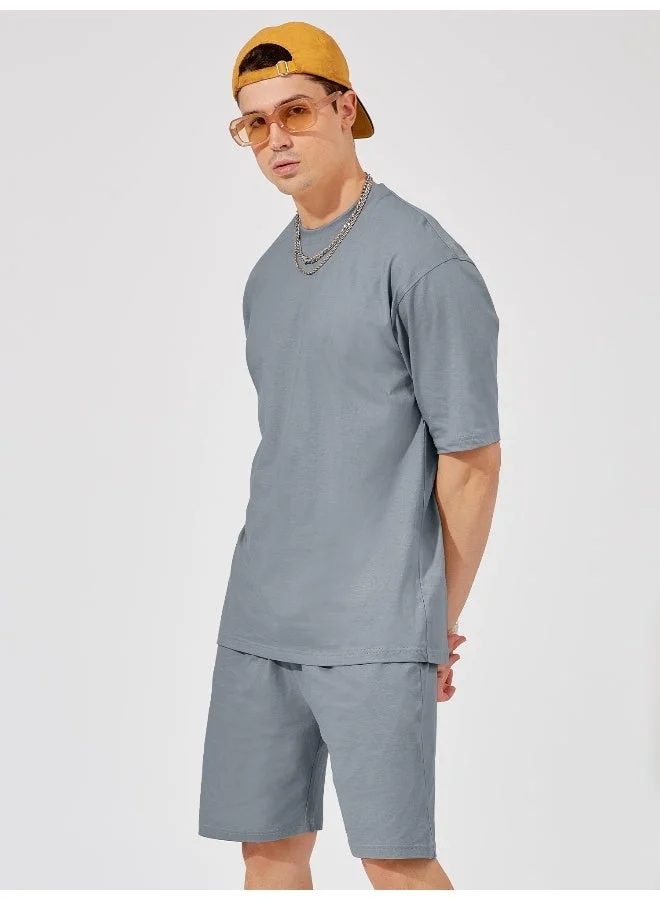 مانياك طقم رجالي قطن رمادي فاتح بأكمام ثلاثة أرباع وقصة واسعة