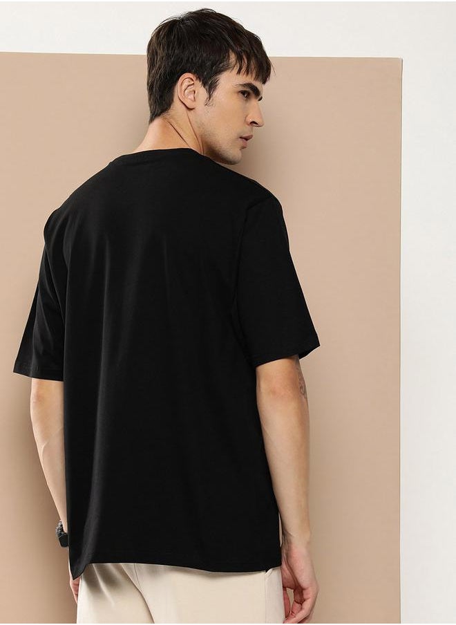 Difference of Opinion Oversized Embossed Print Round Neck T-Shirt by Styli  - Image 3