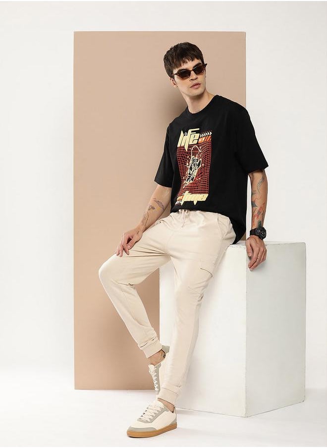 Difference of Opinion Oversized Embossed Print Round Neck T-Shirt by Styli  - Image 4
